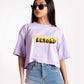 Stylera lavender oversized crop top worn by woman with sunglasses and blue jeans