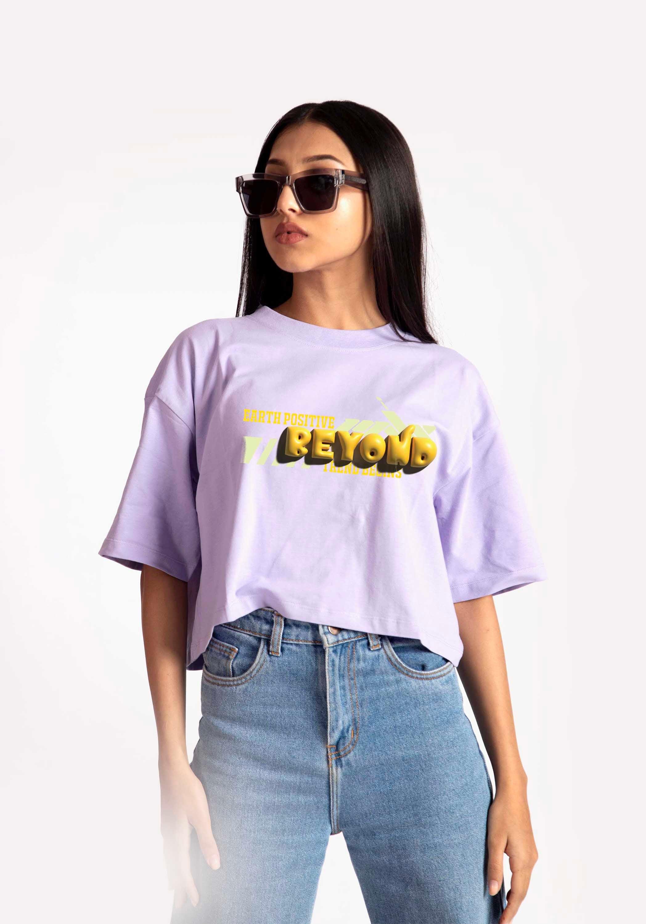 Stylera lavender oversized crop top worn by woman with sunglasses and blue jeans