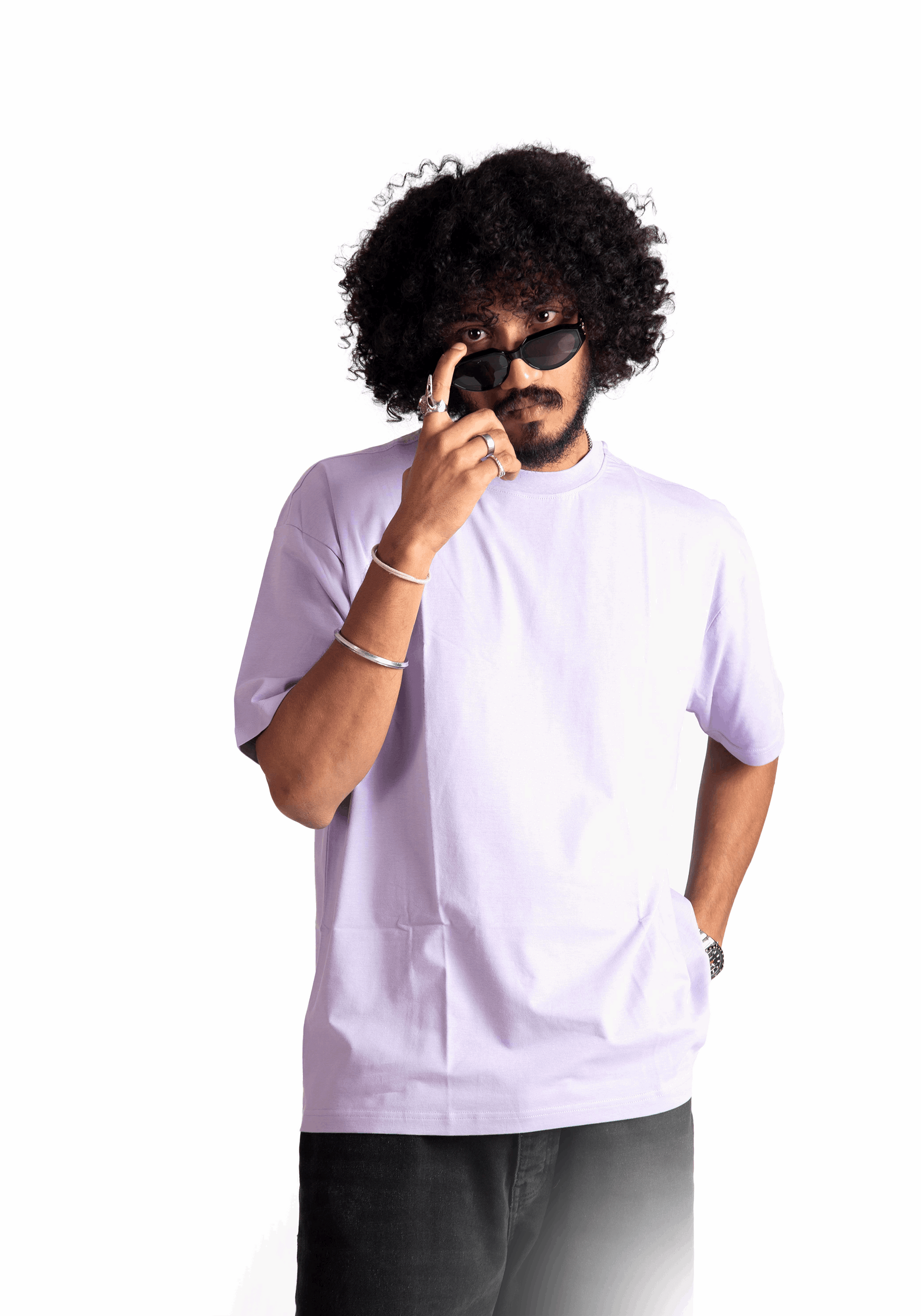 Man wearing Stylera lavender oversized t-shirt with black pants and sunglasses