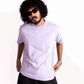 Stylera lavender oversized t-shirt worn by male model with sunglasses and black pants