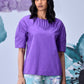 Stylera model wearing lavender regular fit top with elbow sleeves and relaxed silhouette