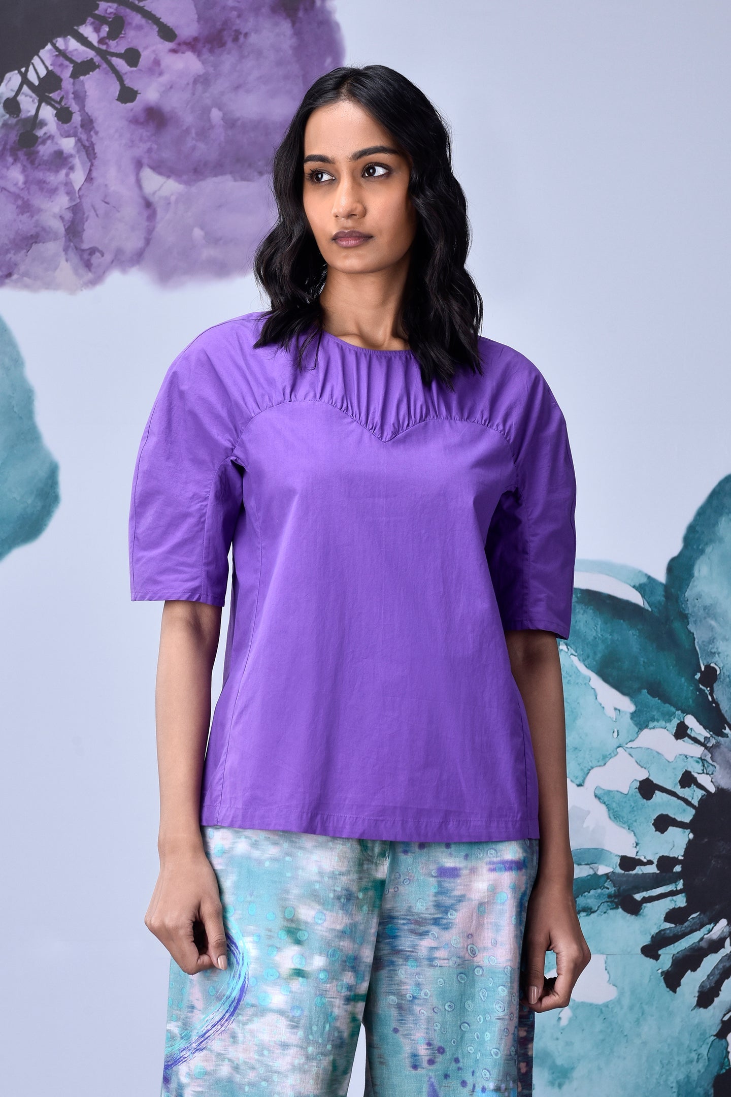Stylera model wearing lavender regular fit top with elbow sleeves and relaxed silhouette