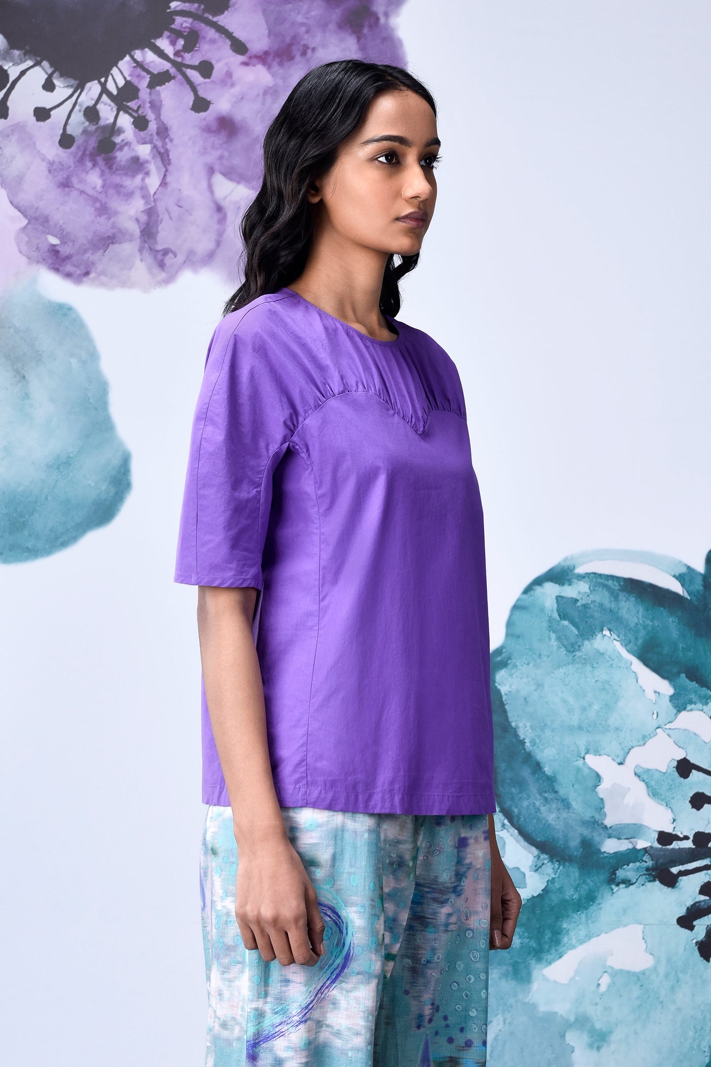 lavender regular fit top on model by Stylera with elbow sleeves and pintuck neckline