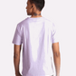 Back view of a man wearing a lavender t-shirt for men by Stylera paired with black pants