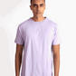 Stylera lavender t-shirt for men worn by male model with short hair and tattooed hand