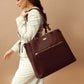 Stylish leather work tote with zipper in brown, ideal for professional and everyday use.