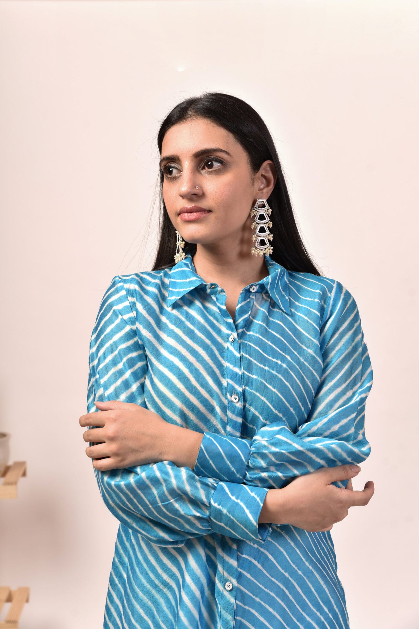 Stylera Lehriya kurta set for women in blue with a stylish design and elegant earrings