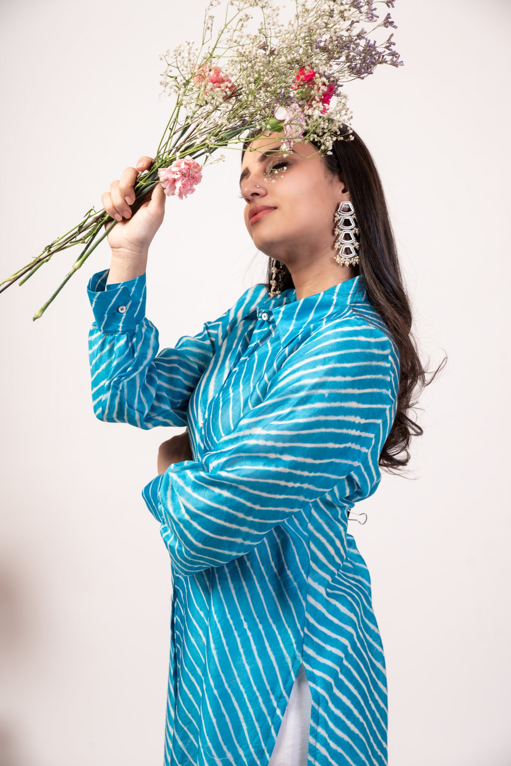 Lehriya kurta set for women in blue with elegant design and floral accents