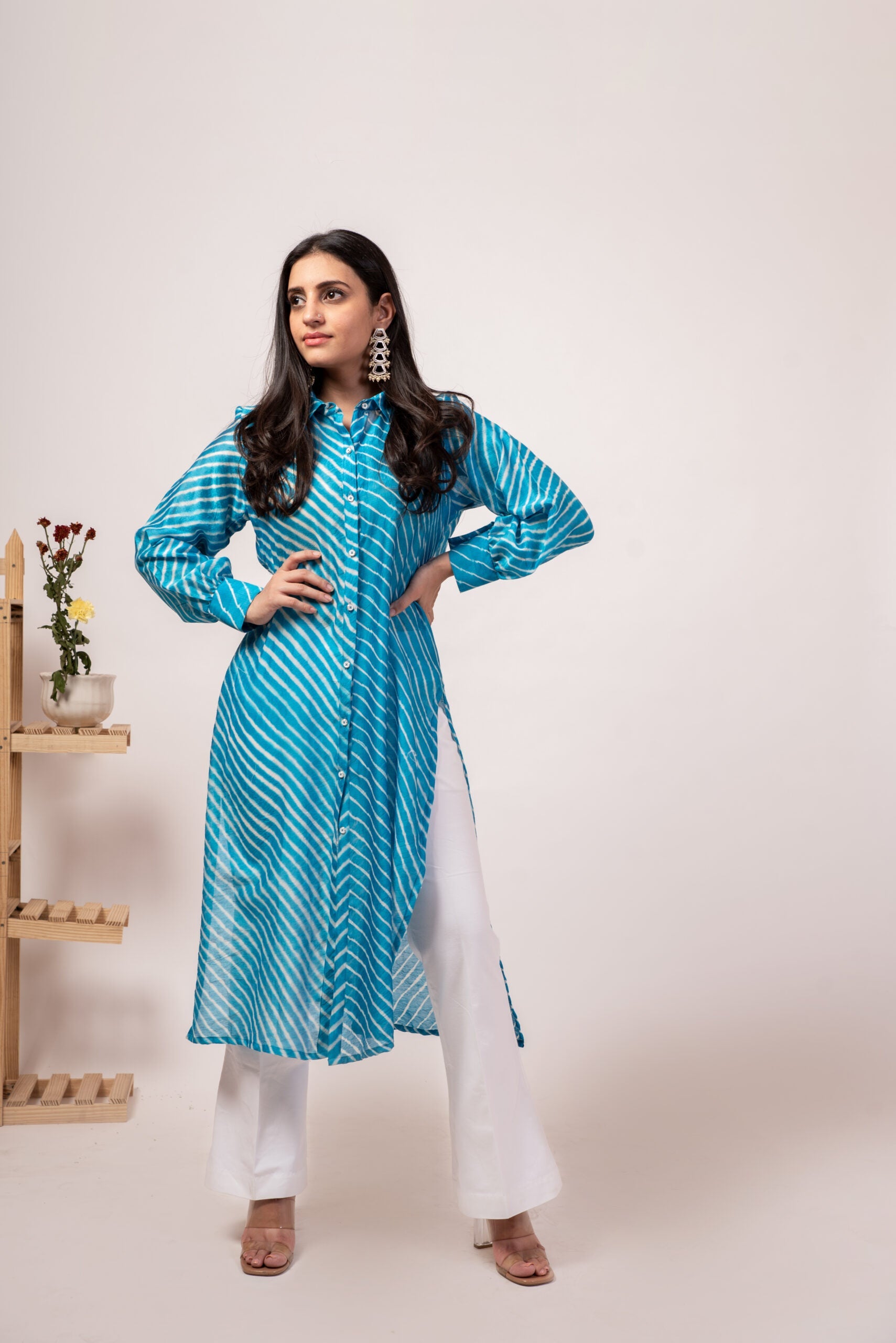 Beautiful blue Lehriya kurta set for women with a stylish button-up design and white palazzo pants