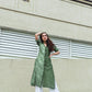 Stylish green Lehriya kurti for women paired with white palazzo pants, perfect for casual outings
