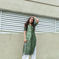 Elegant green Lehriya kurti for women with stripes, paired with white palazzo pants, perfect for casual outings