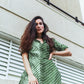 Stylish green Lehriya kurti for women featuring a button-down design and relaxed fit