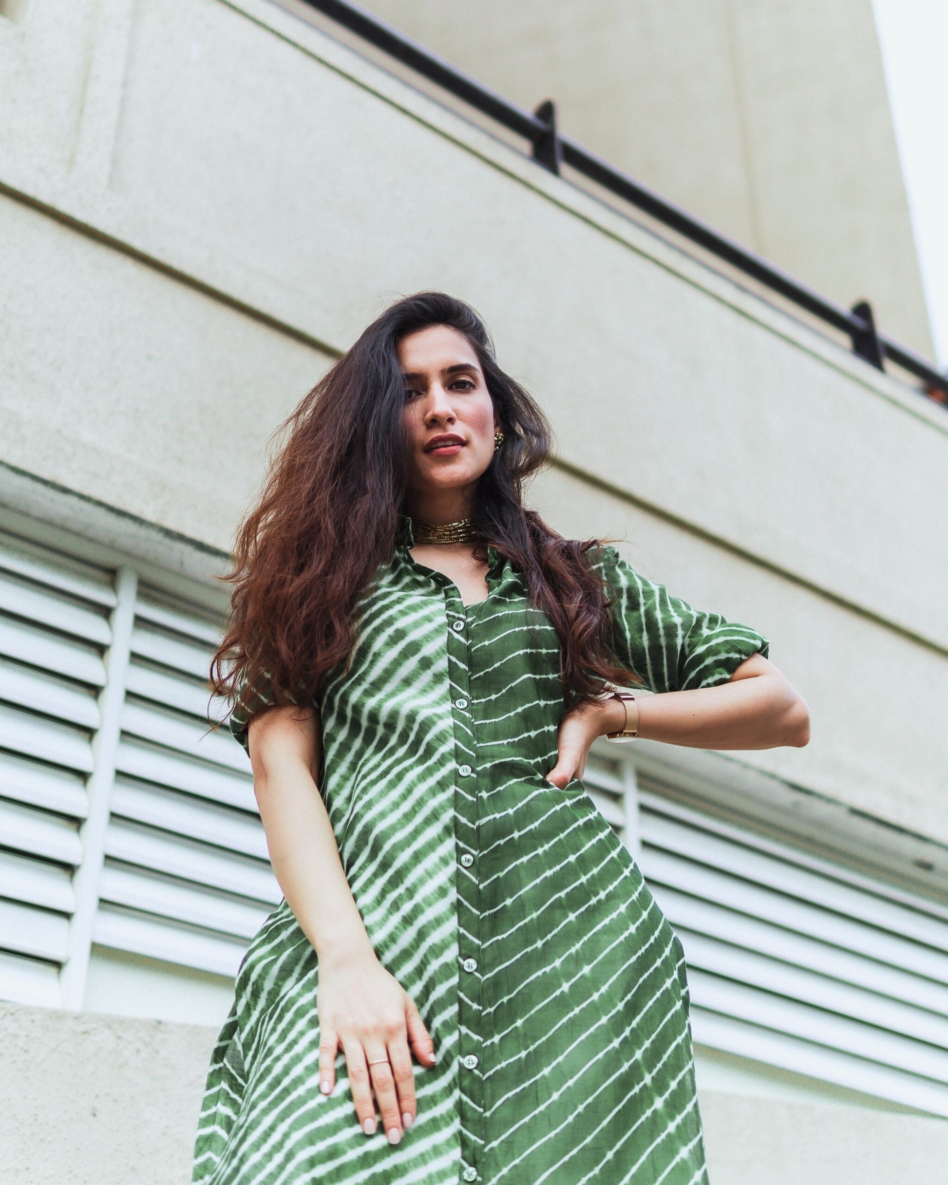 Stylish green Lehriya kurti for women featuring a button-down design and relaxed fit