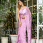 Elegant light pink floral saree with intricate embroidery, perfect for special occasions
