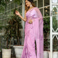 Elegant light pink floral saree with intricate embroidery, perfect for festive occasions