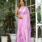 Elegant light pink floral saree with intricate designs, perfect for festive occasions and celebrations