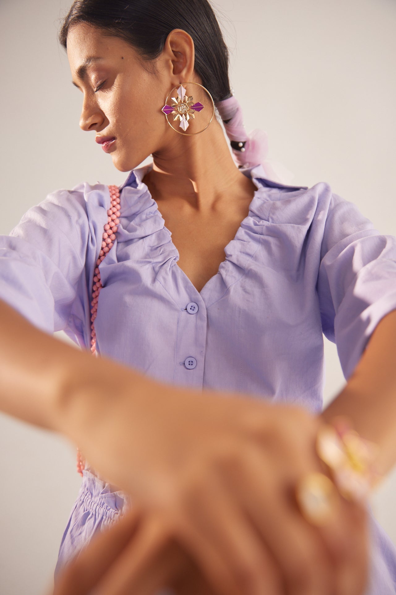 Stylera light purple fashion top with ruffled neckline and button front detail