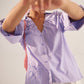 Stylera light purple fashion top with ruffled neckline and button front