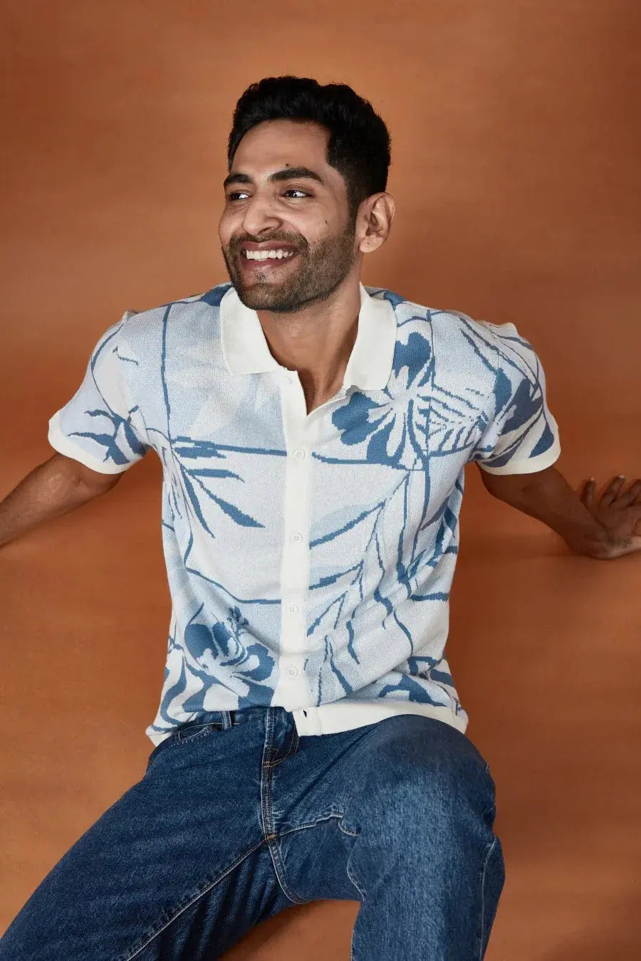 Lightweight beachwear shirt in blue with floral design, perfect for casual summer outings