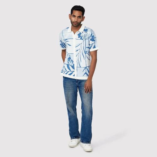 Men's lightweight beachwear shirt in white with blue floral print, perfect for summer outings