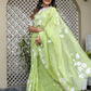 Elegant lightweight party wear saree in light green with floral embroidery, perfect for festive occasions