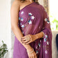 Elegant lightweight party wear saree in purple with floral prints, perfect for festive occasions