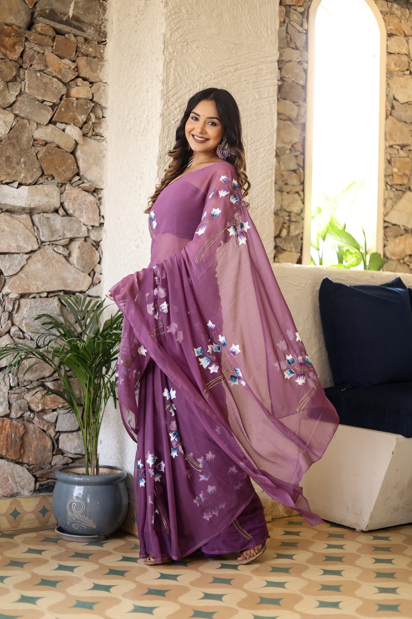 Lightweight party wear saree in purple with floral embroidery, perfect for elegant celebrations