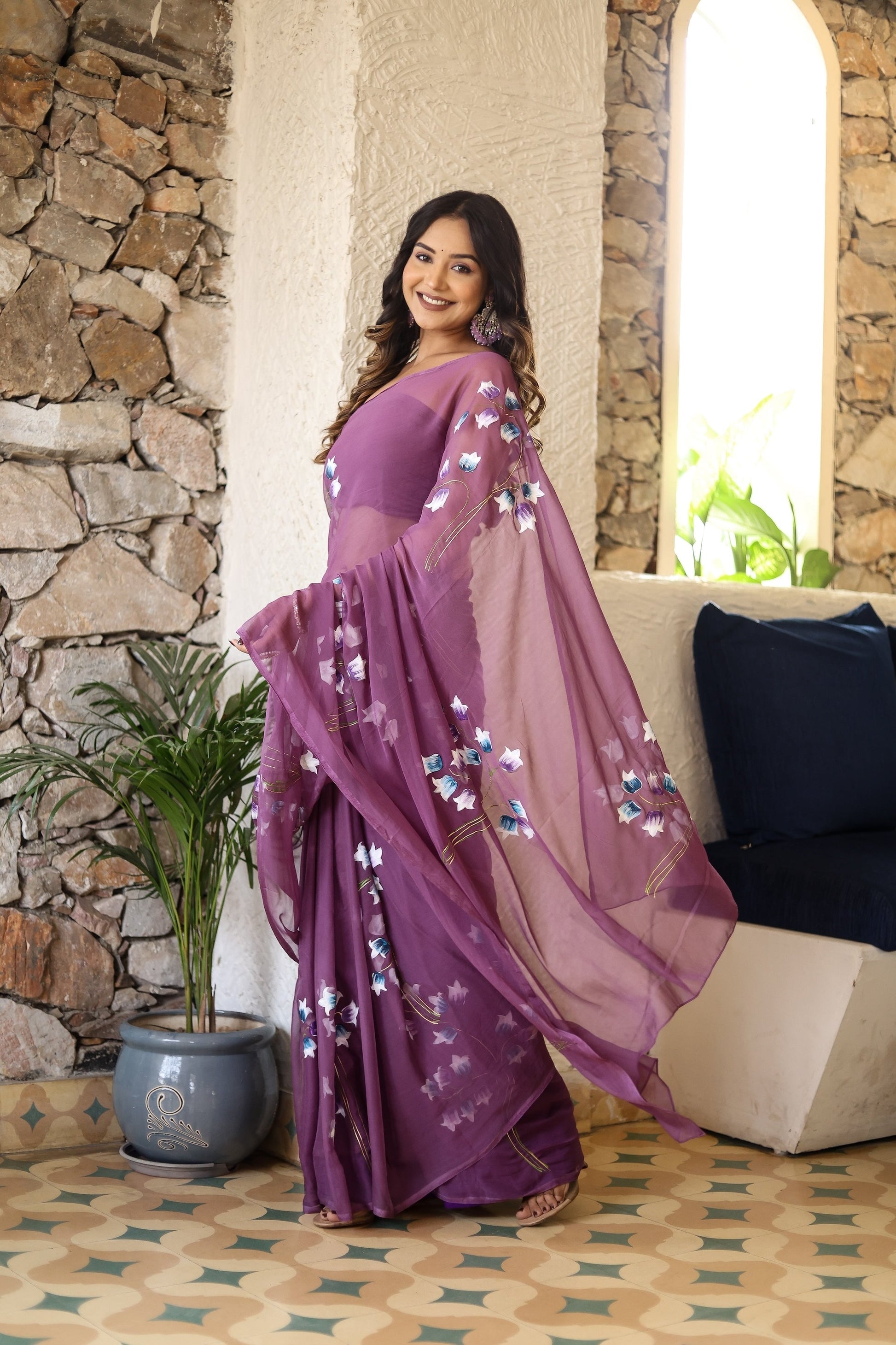 Lightweight party wear saree in purple with floral embroidery, perfect for elegant celebrations