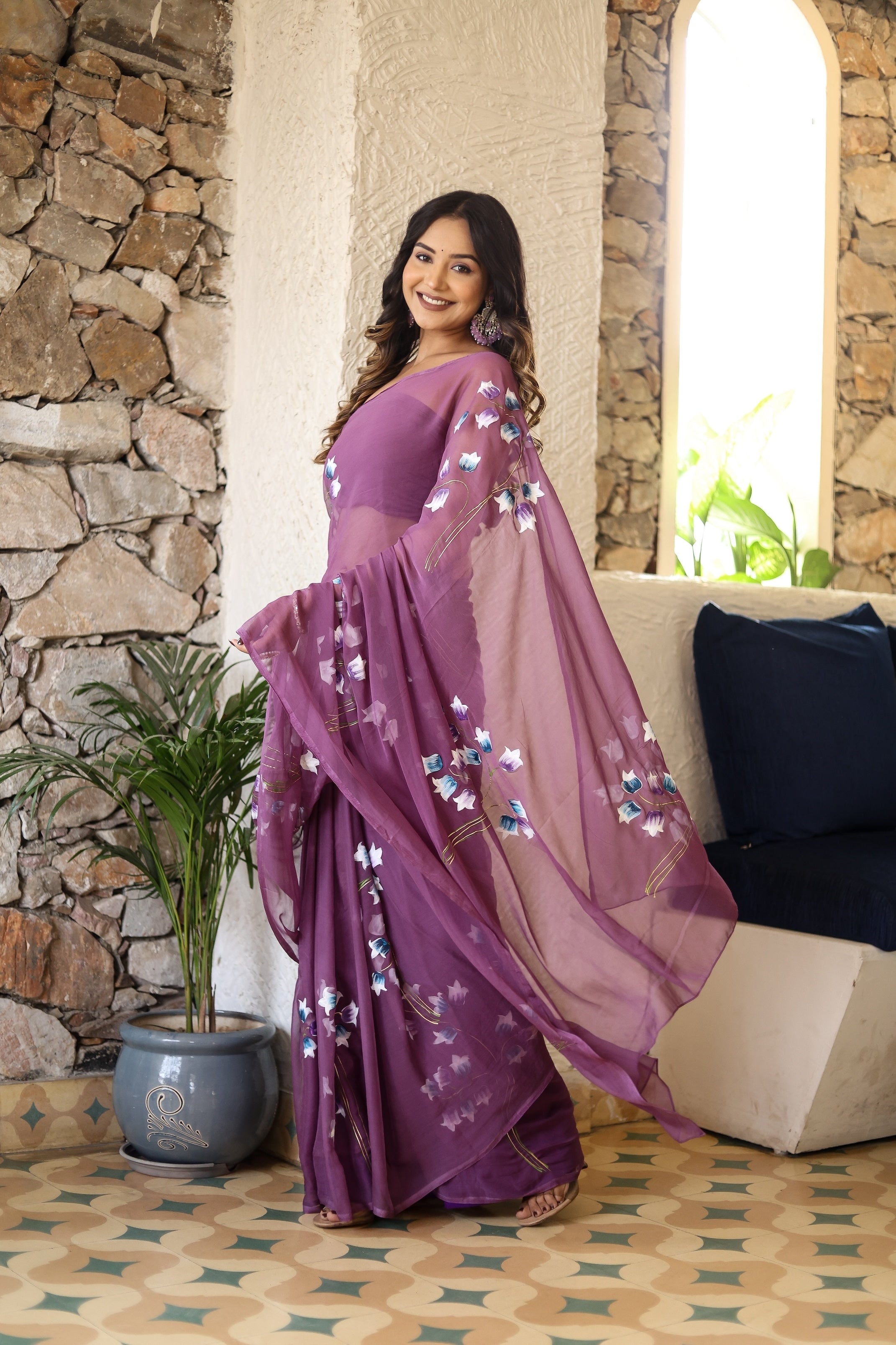 Lightweight party wear saree in purple with floral embroidery, perfect for elegant celebrations