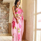 Elegant lightweight party wear saree in pink with floral prints, perfect for festive occasions.