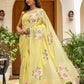 Elegant lightweight party wear saree in yellow with floral prints and tassel details
