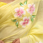 Elegant lightweight party wear saree in yellow with pink floral embroidery details