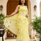 Elegant lightweight party wear saree in yellow with floral embroidery and tassel detailing