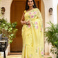 Stylera lightweight party wear saree in yellow with floral patterns and elegant tassels