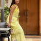 Elegant lightweight party wear saree in yellow with floral designs, perfect for festive occasions