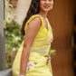 Elegant lightweight party wear saree in yellow with floral designs, perfect for festive occasions.