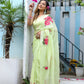 Elegant lightweight pastel saree with floral print designed for festive occasions and stylish gatherings.