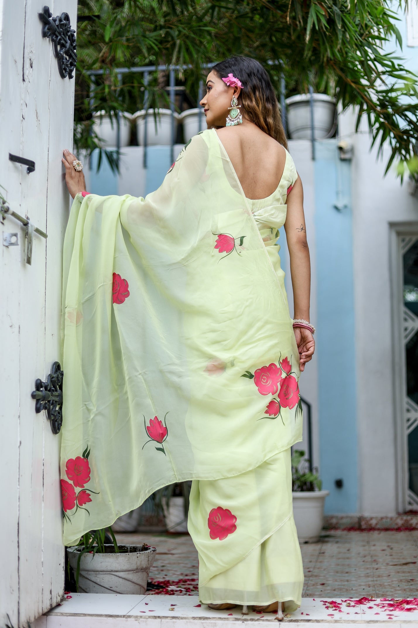Elegant lightweight pastel saree with floral print featuring pink roses for a graceful look