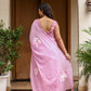 Elegant lightweight summer saree for women in pink with embroidered floral details and tassels