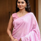 Stylera lightweight summer saree for women in soft pink with floral designs, perfect for warm weather.