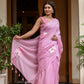 Lightweight summer saree for women in soft pink with floral embroidery and tassel details