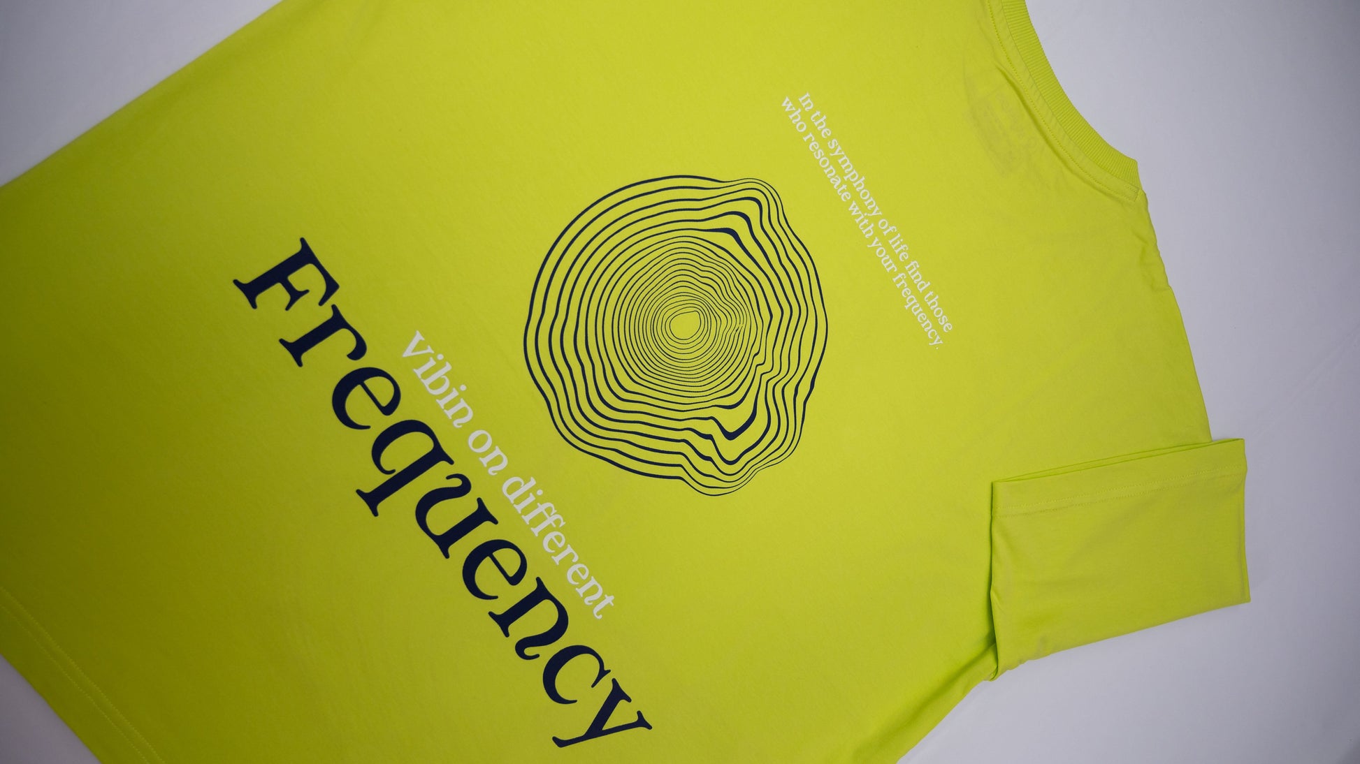 Lime green graphic t-shirt oversized with Frequency design and modern typography
