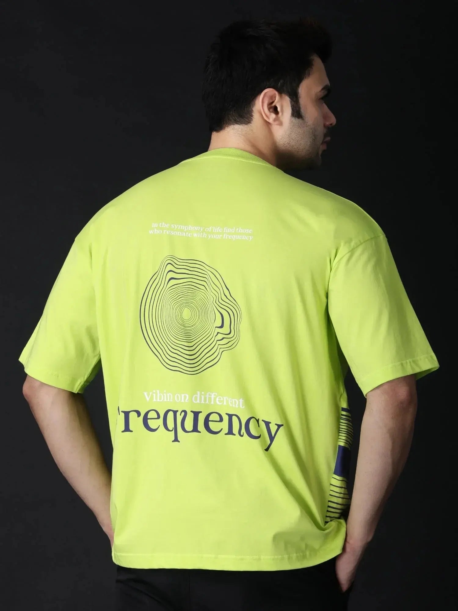 Lime green graphic t-shirt oversized featuring a unique frequency design on the back