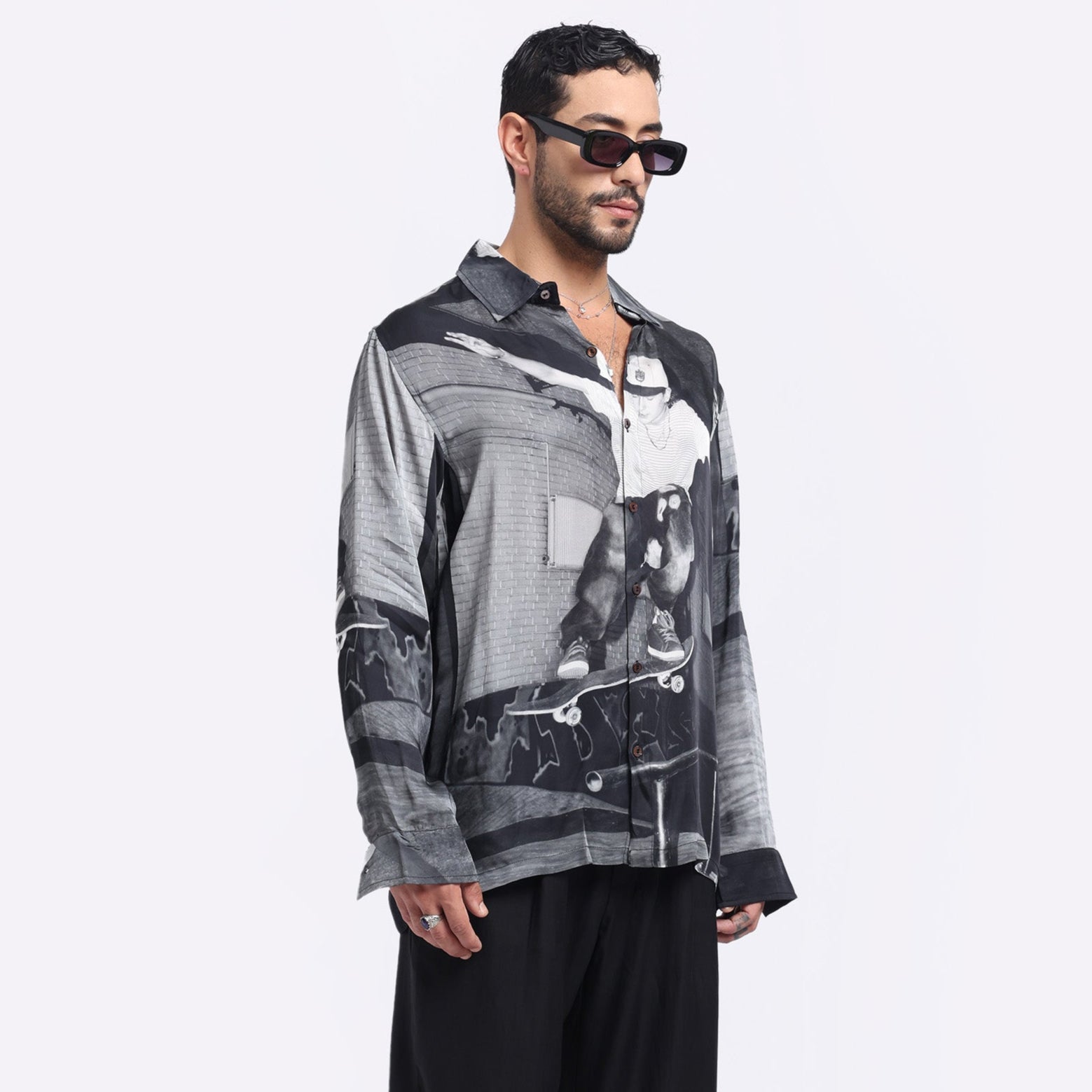 Stylera long sleeve urban skater shirt featuring a bold skateboarding graphic design in black and white