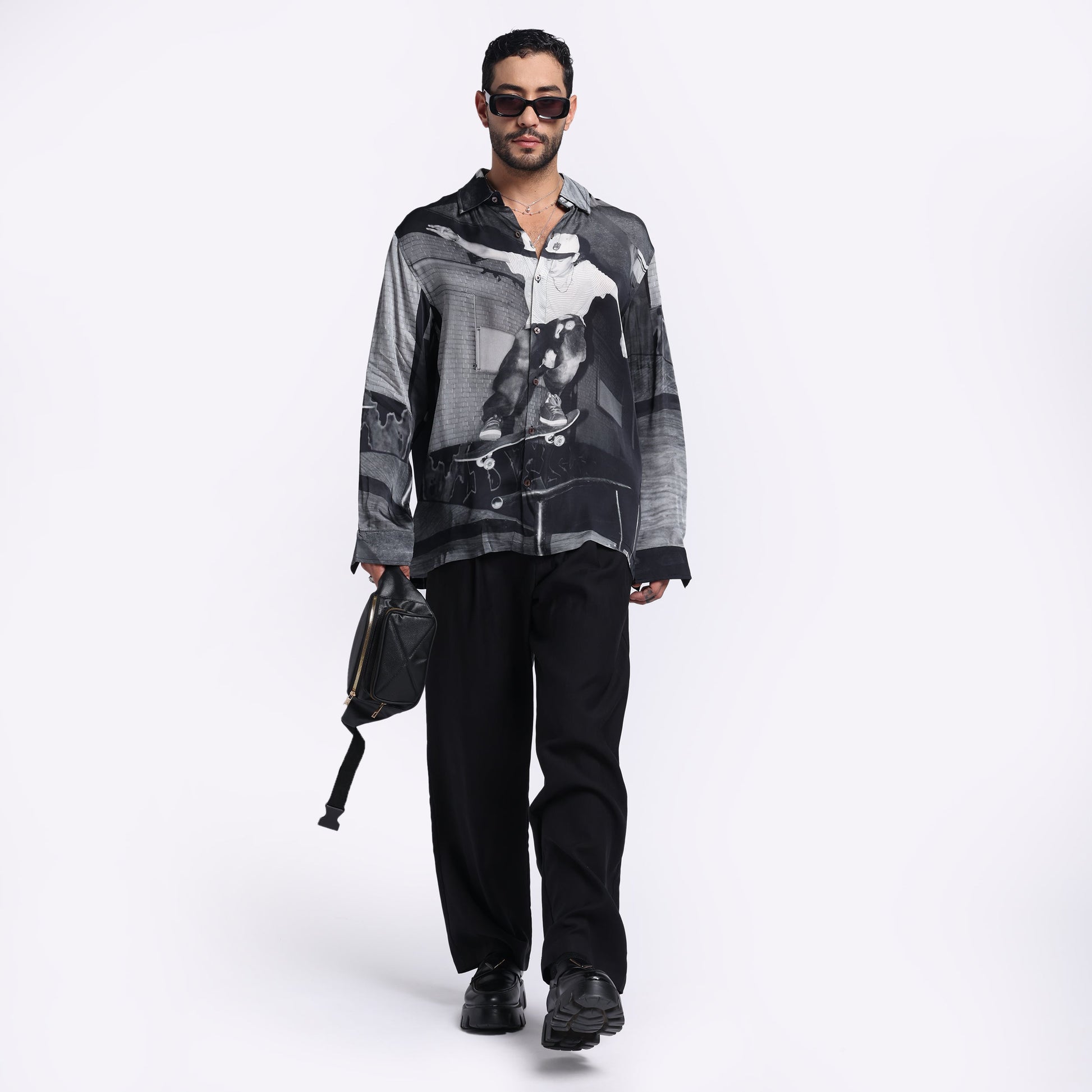 Stylera long sleeve urban skater shirt in black and gray, modeled with casual pants and accessories