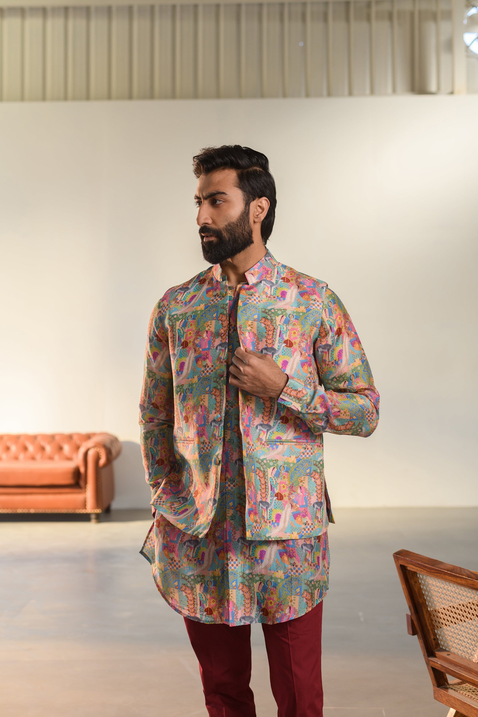 Luxury ethnic wear for men featuring a stylish Kurta Jacket Set with vibrant patterns