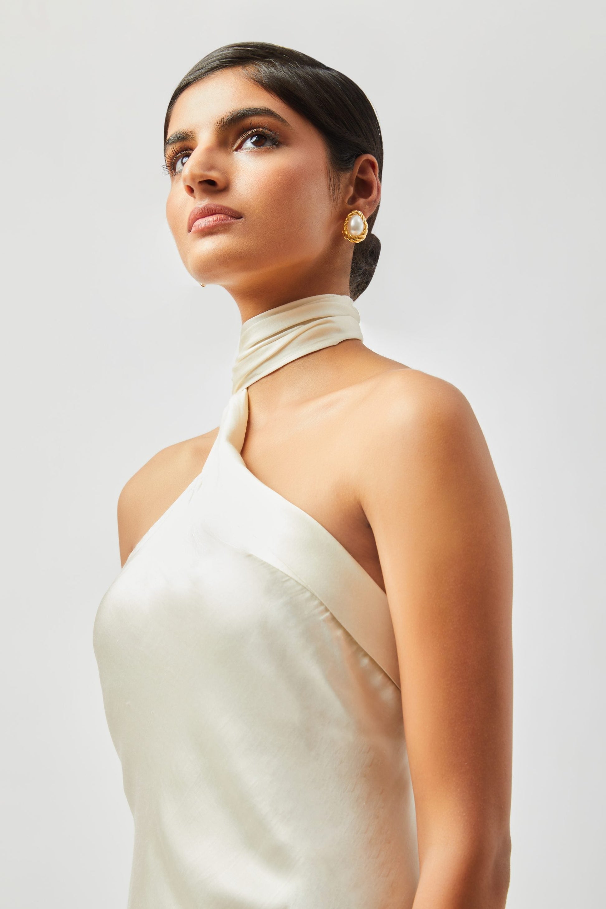 Stylera luxury long gown in elegant satin with one-shoulder design and neck wrap detail