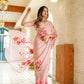 Elegant luxury statement saree for special occasions featuring floral designs and soft draping