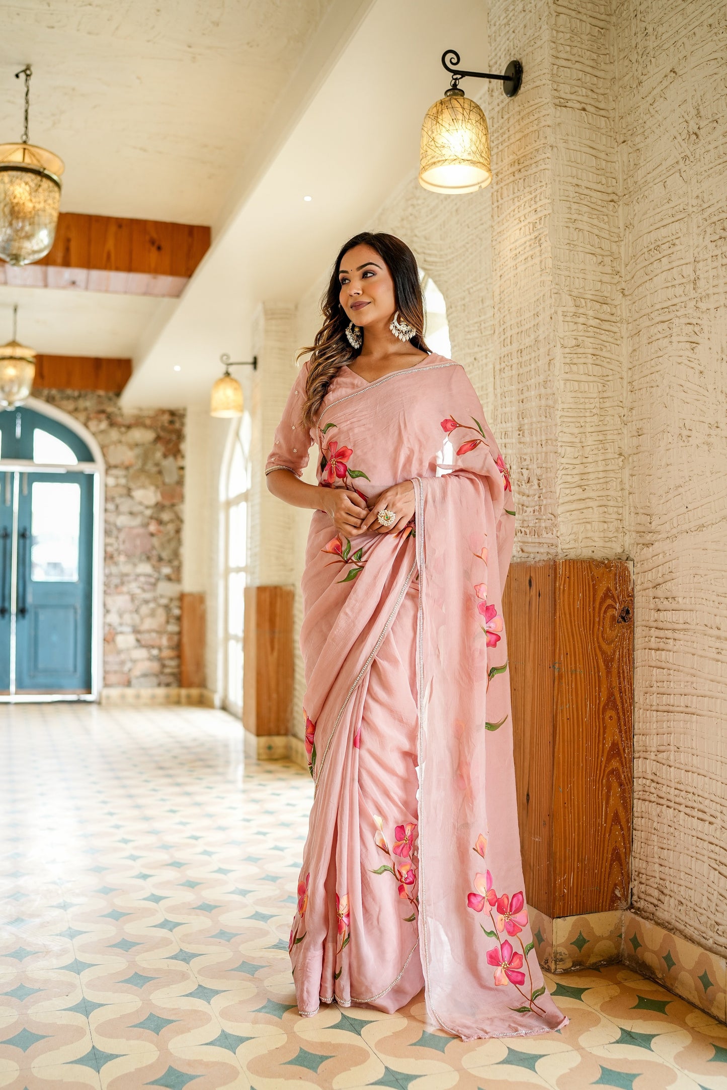 Elegant Stylera luxury statement saree for special occasions with floral embroidery in soft pink