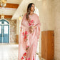 Elegant luxury statement saree for special occasions in soft pink with floral embroidery